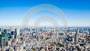 Panoramic modern city skyline aerial view under blue sky in Tokyo, Japan