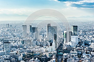 Panoramic modern city skyline aerial view under blue sky in Tokyo, Japan