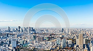 Panoramic modern city skyline aerial view under blue sky in Tokyo, Japan