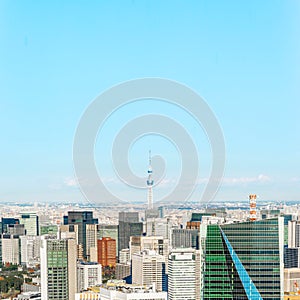 Panoramic modern city skyline aerial view under blue sky in Tokyo, Japan