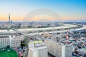 Panoramic modern city skyline bird eye aerial view with tokyo skytree under dramatic sunset glow and beautiful cloudy sky in Tokyo