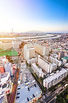 Panoramic modern city skyline bird eye aerial view with tokyo skytree under dramatic sunset glow and beautiful cloudy sky in Tokyo