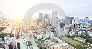 Panoramic modern city skyline bird eye aerial view from tokyo tower under dramatic sunrise and morning blue sky in Tokyo, Japan