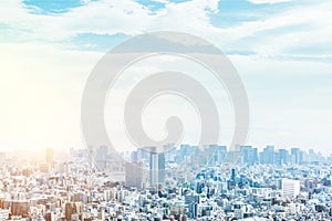 Panoramic modern city urban skyline bird eye aerial view under sun & blue sky in Tokyo, Japan