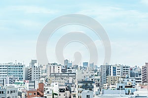 Panoramic modern city urban skyline bird eye aerial view under sun & blue sky in Tokyo, Japan