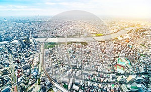 Panoramic modern city urban skyline bird eye aerial view under sun & blue sky in Tokyo, Japan