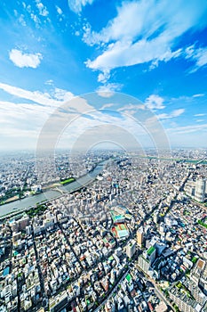 Panoramic modern city urban skyline bird eye aerial view under sun & blue sky in Tokyo, Japan