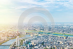 Panoramic modern city urban skyline bird eye aerial view under sun & blue sky in Tokyo, Japan