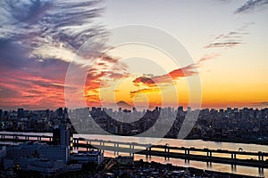 Panoramic modern cityscape building bird eye aerial view with Mount Fuji under sunrise and morning blue bright sky in Tokyo,Japan