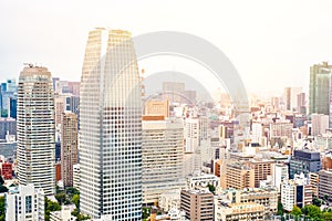 Panoramic modern cityscape building bird eye aerial view from tokyo tower under sunrise and morning blue bright sky in Tokyo, Japa