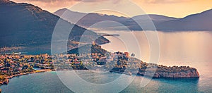 Panoramic morning cityscape of Pischina Salida resort. Colorful summer view from Caccia cape of Sardinia island, Italy, Europe.