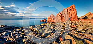 Panoramic morning view of Red Rocks Beach, Arbatax. Amazing spring seascape of Mediterranean sea.