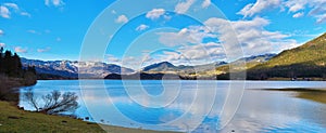 Panoramic mountain landscape of Hallstatt lake at sunny day in Austrian Alps, Salzkammergut region