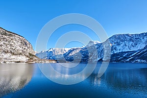 Panoramic mountain landscape of Hallstatt lake at sunny day in Austrian Alps, Salzkammergut region