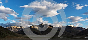 Panoramic mountain landscapes with blue sky and white clouds at Zanskar valley in northern India photo