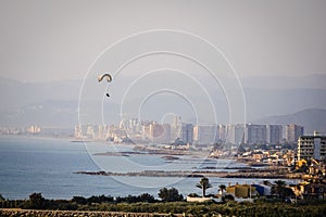 Panoramic of a mountain with a parapent