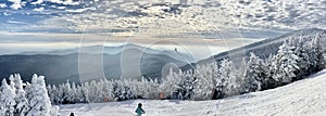 Panoramic mountain view of beautiful mountain peaks at snow day on the top of Stowe Mountain Ski resort