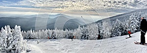 Panoramic mountain view of beautiful mountain peaks at snow day on the top of Stowe Mountain Ski resort