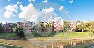 Panoramic multi-story apartment complex in suburban Dallas Fort-Worth, USA sunset