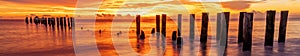 Panoramic of Naples pier captured against a beautiful sunset sky