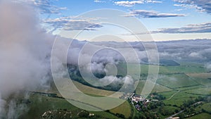 Panoramic nature hills landscape with a low clou coming