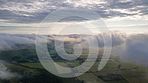 Panoramic nature hills landscape with a low clou coming