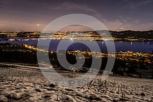 Panoramic night photography lake zurich from altendorf winter night