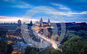 Night view of ancient fortress castle in Kamianets-Podilskyi, Khmelnytskyi Region, Ukraine. Old ÃÂastle photo on a