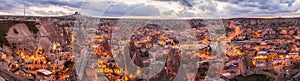 Panoramic night view of Goreme and Uchisar on horizon, Cappadocia, Turkey. A world-famous tourist center of balloon flight