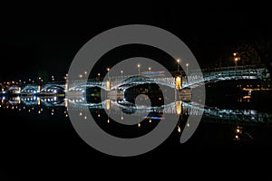 Panoramic night wide view of the Salamanca city with Enrique Esteban bridge photo