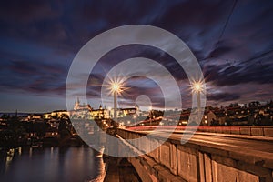 Panoramic nightscape above at Charles Bridge Prague Castle and river Vltava Prague Czech Republic