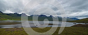 A panoramic perspective of the fiord of BerufjÃÂ¶rÃÂ°ur Berufjordur in eastern Iceland photo