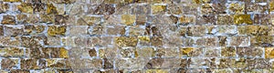 Panoramic photo of a brick wall. Texture for design. it is horizontal modern stone wall for pattern and background.