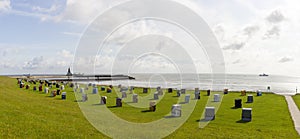 Panoramic photo of the coast of Cuxhaven Lower Saxony, Germany. Beach baskets on the North Sea