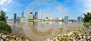 Ho Chi Minh City seen from the banks of the Saigon River, Vietnam.