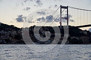 Panoramic photo of the Istanbul Bosphorus. The landscape of Istanbul is a beautiful sunset with clouds. Silhouette