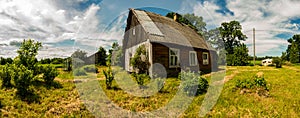 Panoramic photography, green meadow with old house