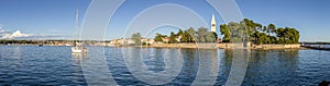 Panoramic picture of the Novigrad shoreline in Croatia during daytime