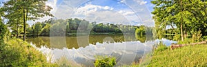 Panoramic picture of peaceful lake in recreation area