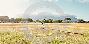 Panoramic of pitcher on field for a game of baseball, ready to pitch and throw the ball. Baseball player standing alone