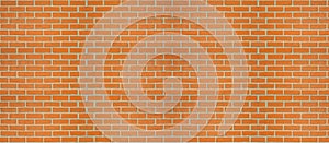 Panoramic red brick wall. Background image in the construction of a wide horizontal wall