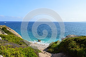 Panoramic seascape : beach with palette of blue, rocky beach, natural and wild. Mallorca, Spain