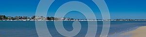 Panoramic of the seascape at Botany Bay with Captain Cook Bridge view crossing to the southern shore of Sydney, Australia.