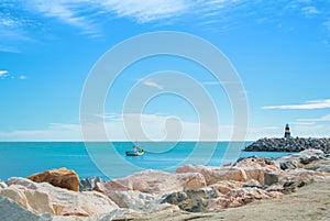 Panoramic seascape of Mediterranean sea with a lonely fishing bo