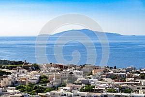 Panoramic shot of  Anacapri town, Ischia island, and the Phlegraean Islands viewed from Monte Solaro photo