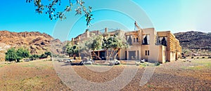 Panoramic shot of a beautiful Feynan ecolodge with the hills in the background located in Jordan photo