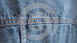 Panoramic shot of a denim jacket, fabric.