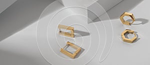 Panoramic shot of geometric shapes modern golden earrings on white background with copy space