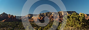 Panoramic shot of Rocks in Sedona, AZ, USA under a blue sly