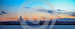 Panoramic shot of a sunset sky over the skyline of Liverpool, UK